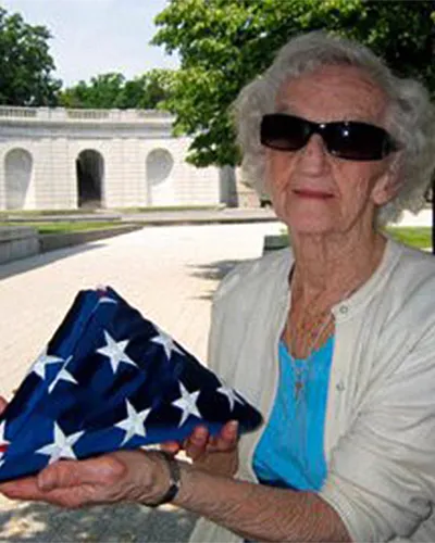 caroline-with-veteran-flag caroline-with-veteran-flag